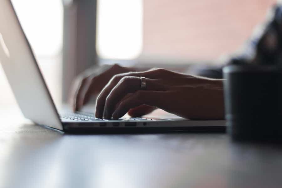 Photo Typing on laptop